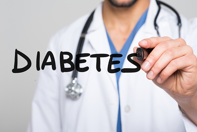 Word "Diabetes" written by profile of a doctor wearing lab coat.