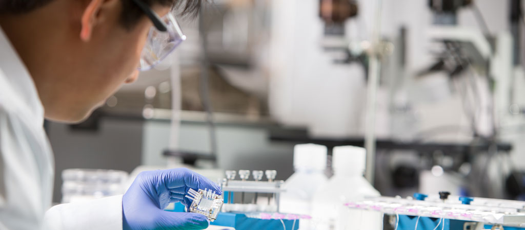 Student performing experiment