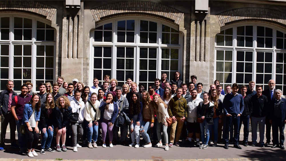 Texas A&M Students pose for a picture in France. 