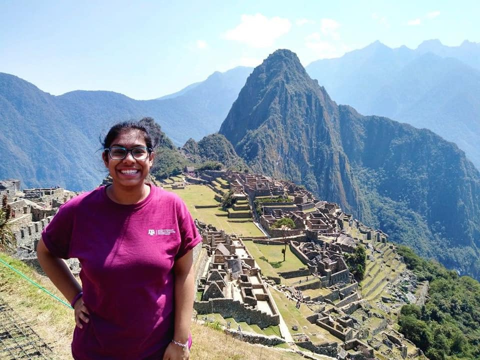 Image of Jainita Chauhan next to Machu Picchu