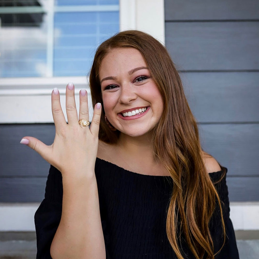 Student Haley Edwards showing her Aggie ring