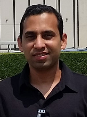 Professional headshot of Dr. Bharat Mahajan.