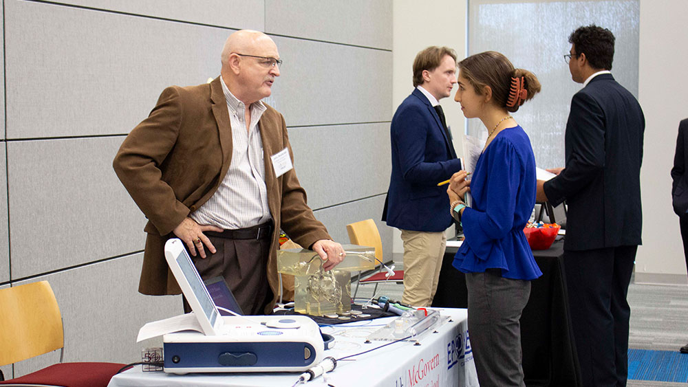 A student speaking with a recruiter at the career fair