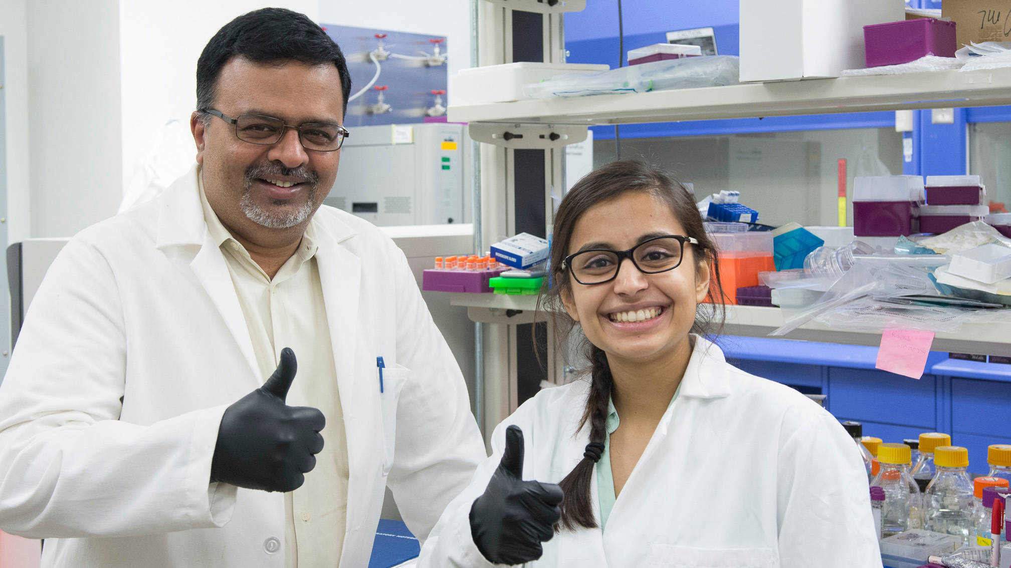 Dr. Jayaraman and student in lab