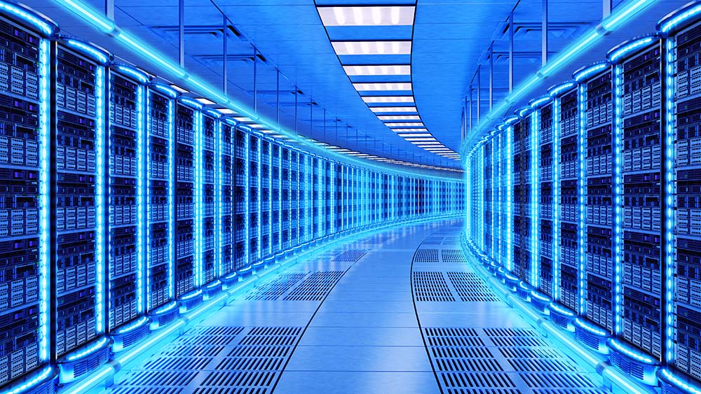 Datacenter aisle in glowing blue.