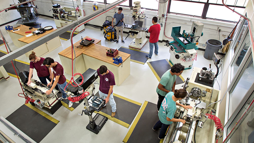 aerial of students working on different equipment in a lab