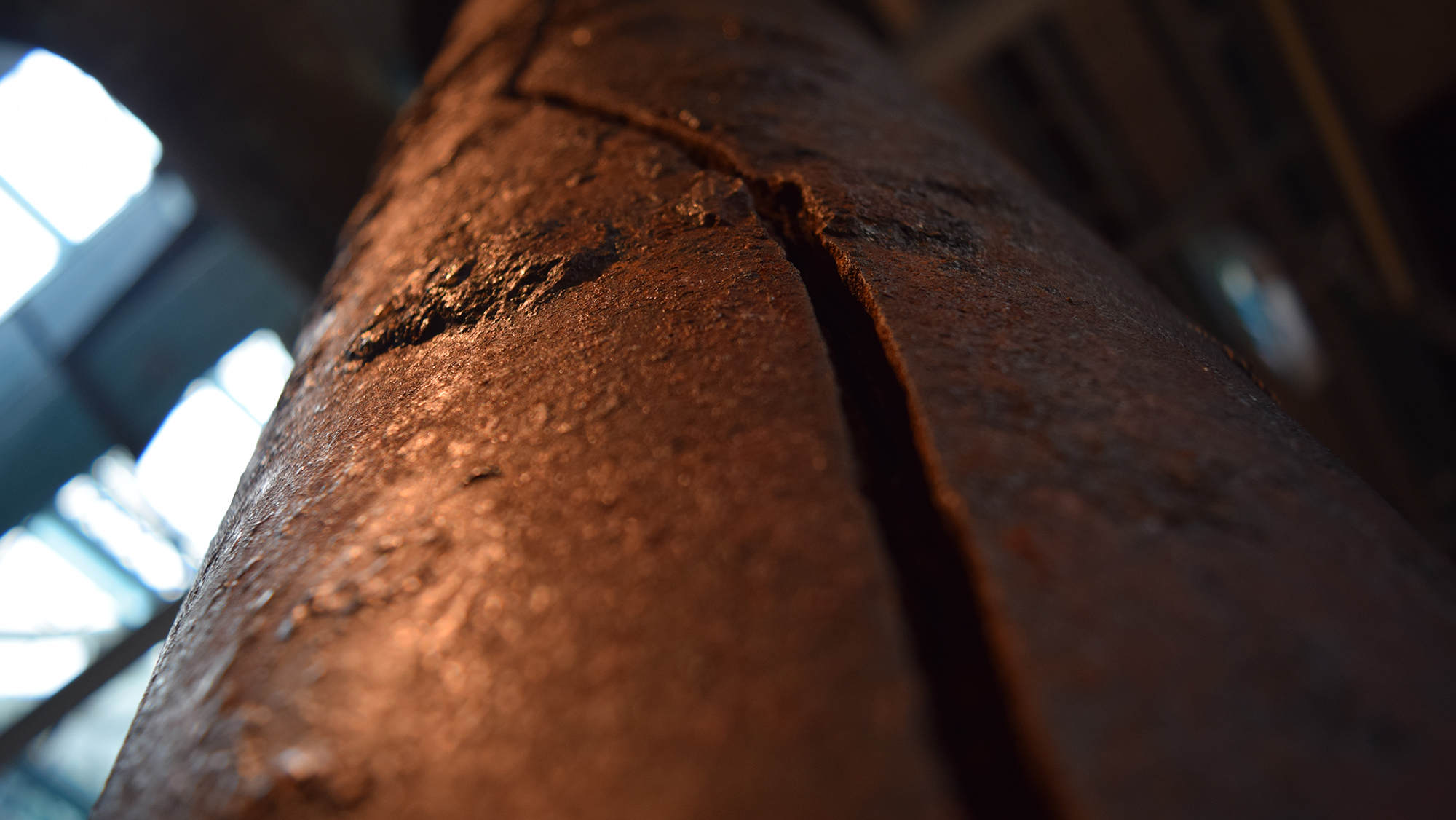 A pipe shows the effects of corrosion. 