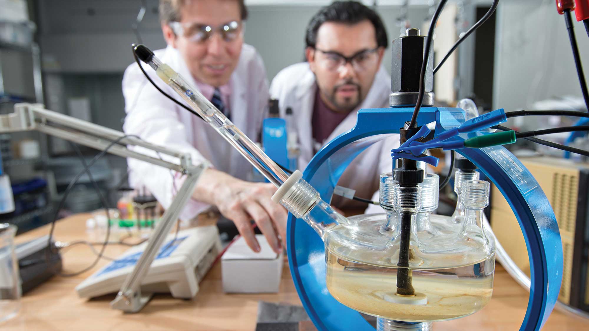 professor and student conducting materials research in a lab