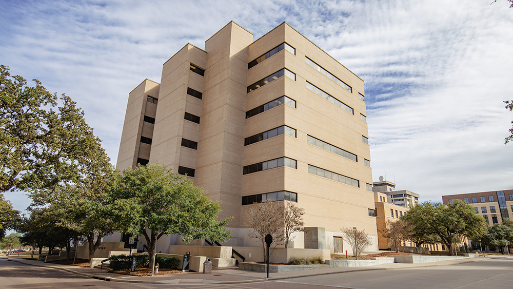 Exterior view of the seven-story tall H.R. Bright Building on the Texas A&amp;M University campus in College Station, Texas.