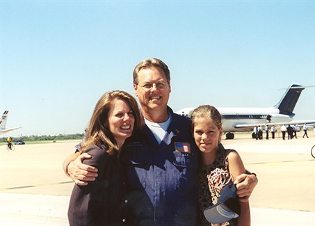 Bennett with wife and daughter