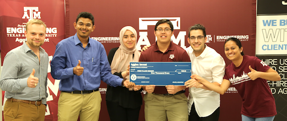 First place Aggies Invent team with prize check.