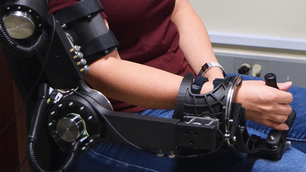 mechanical exoskeleton on a student's arm