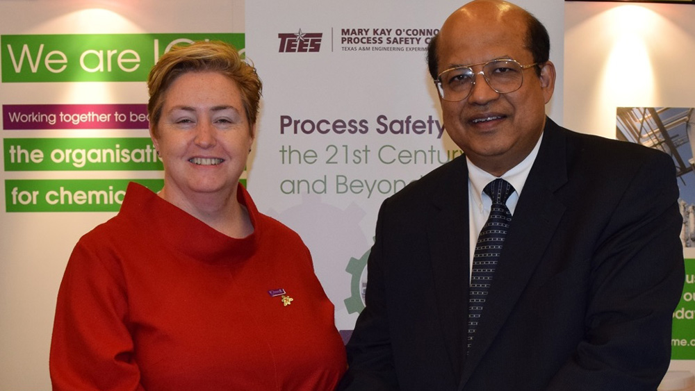 Dr. M. Sam Mannan standing beside Trish Karin. Both are smiling at the camera. 