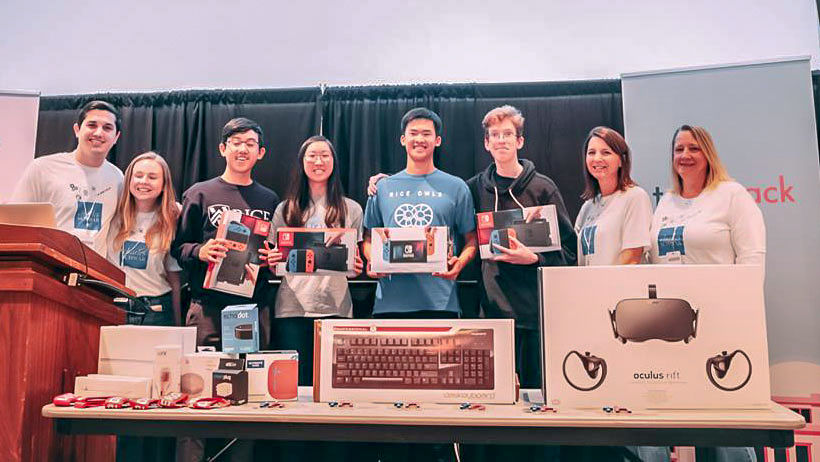 Image of participants with prizes.