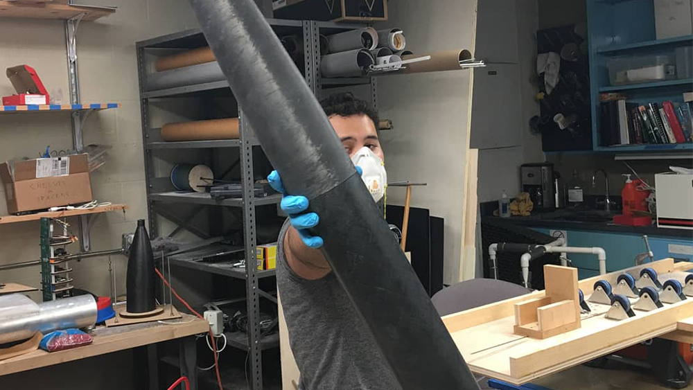 Gerardo Barillas working on rocket nose cone