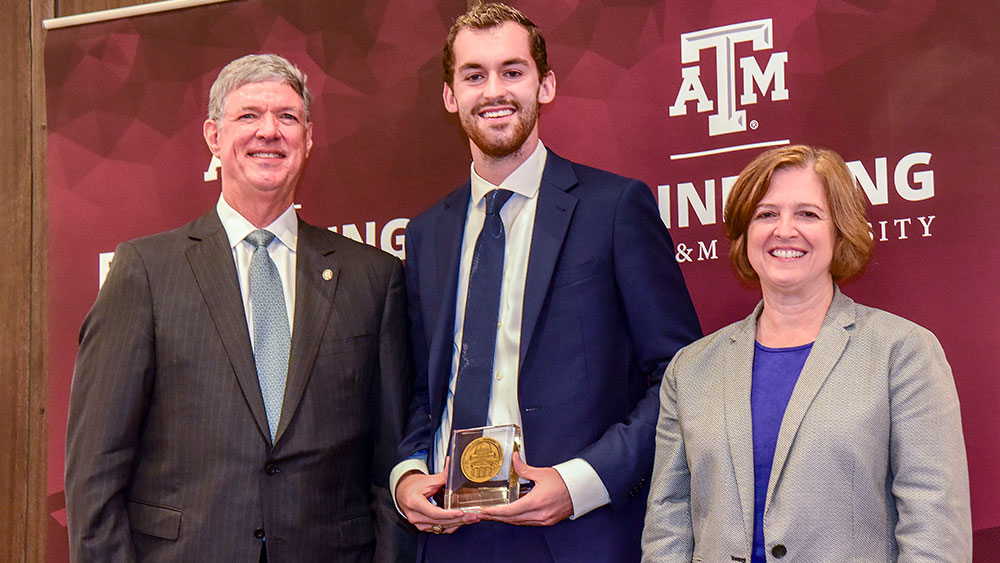 Luke Oaks with Craig Brown and Dean Kathy Banks during the Outstanding Senior Engineering Awards ceremony.