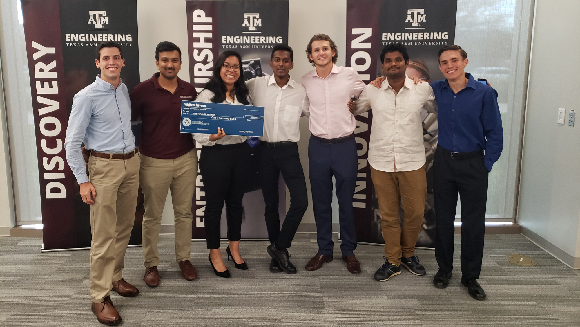 Team Flo-BOT-emist pose with their $1,000 prize at EnMed Aggies Invent 2019.