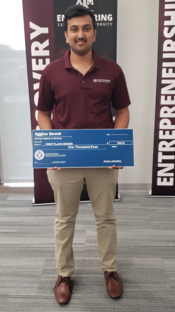 Jay Thiagarajan poses with his team's $1,000 prize at EnMed Aggies Invent 2019.