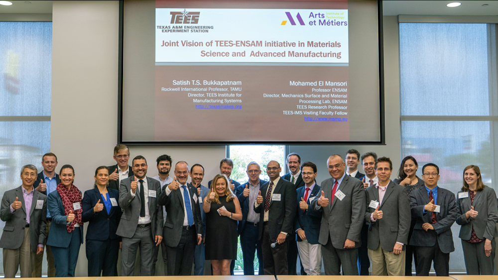 Attendees of the third workshop for the transatlantic partnership between the Texas A&M Engineering Experiment Station and Arts et Métiers Institute of Technology kick off the day with a gig 'em.