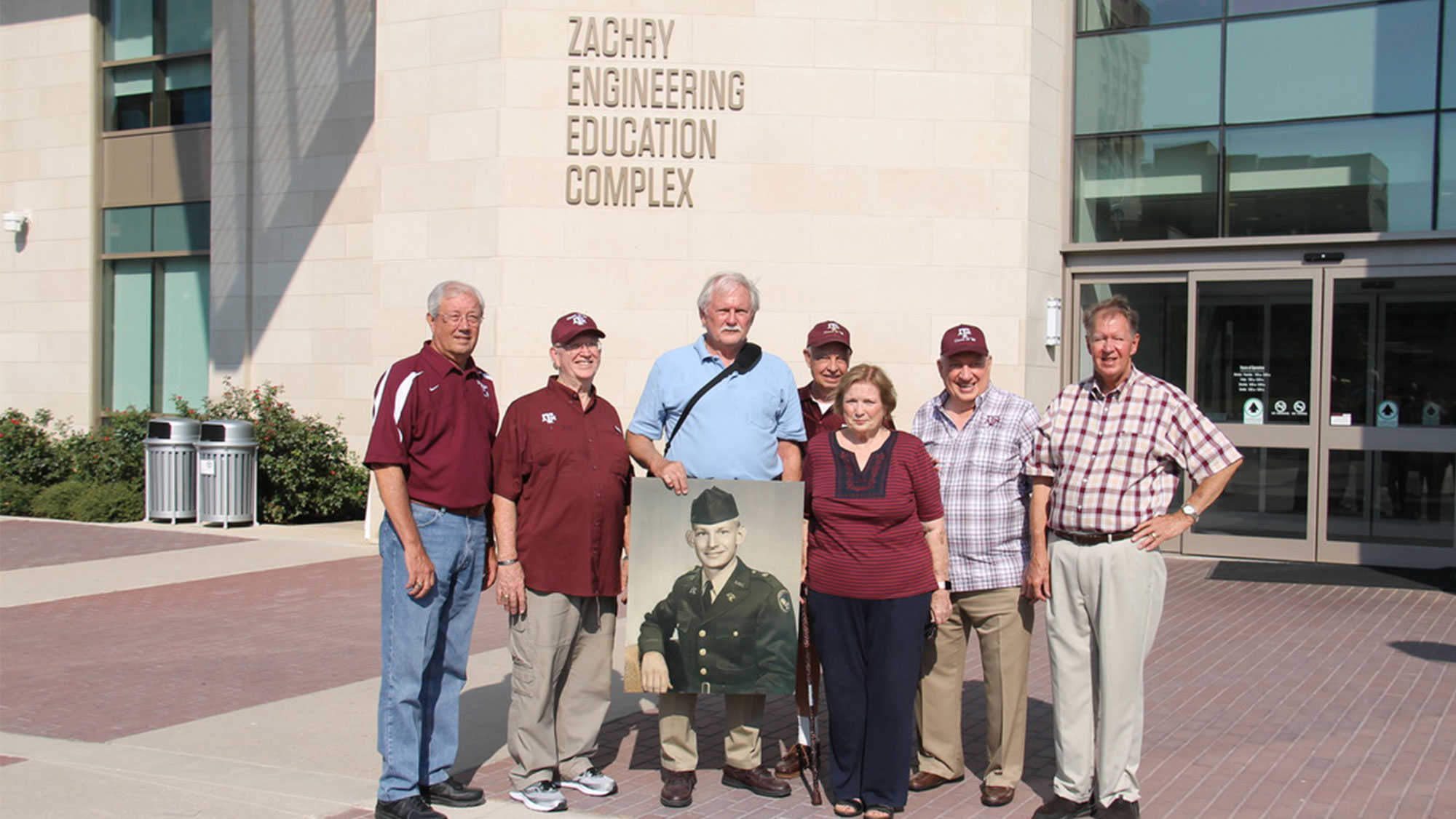 Class of '62 Squadron 13 members in front of the Zachry Engineering Education Complex. 