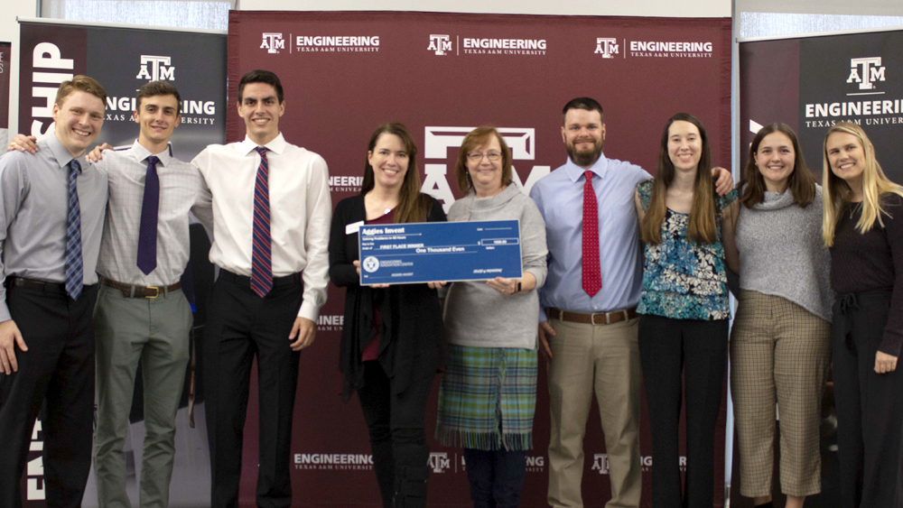 The winning team from Aggies Invent VetMed receiving their check