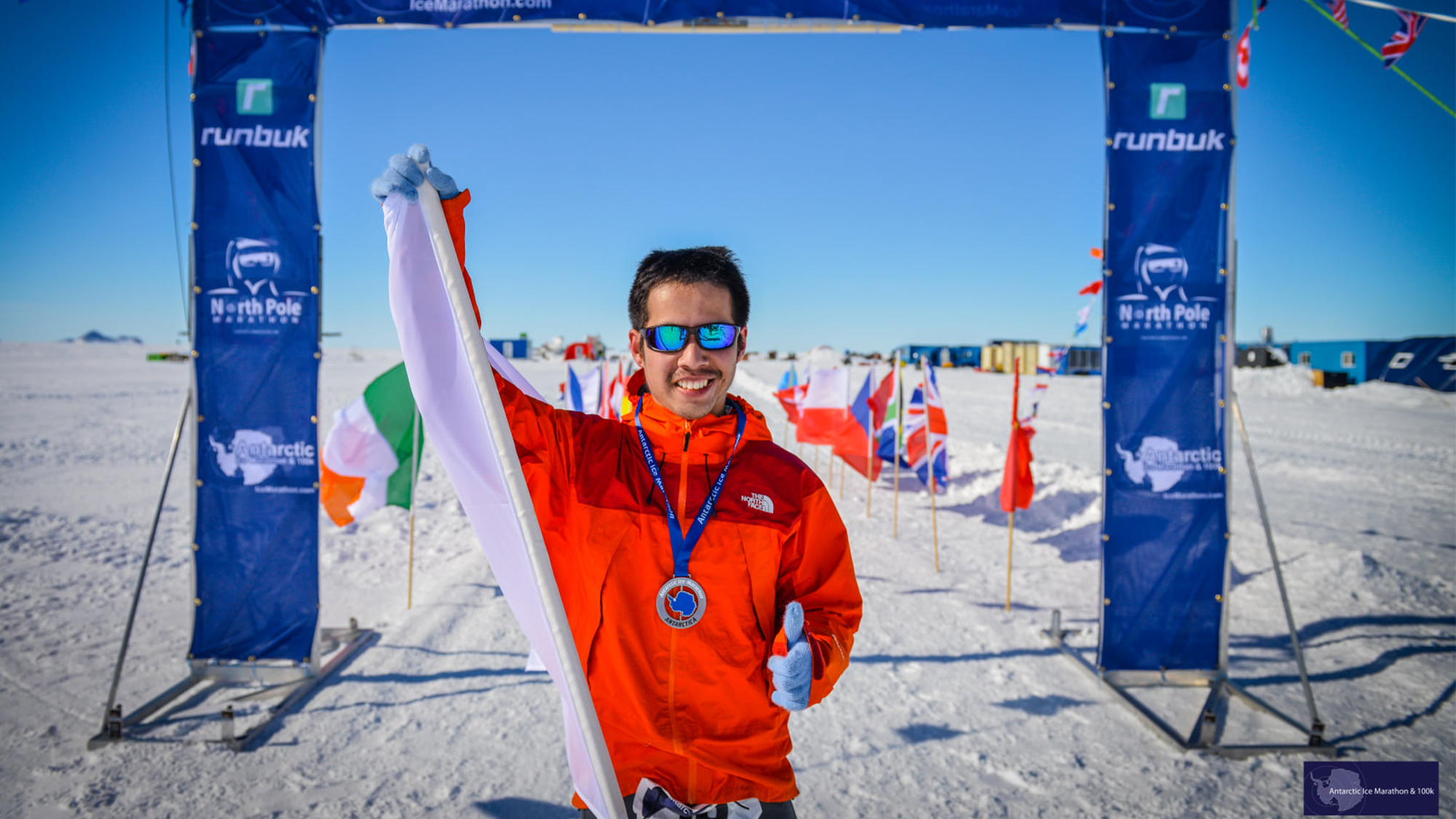 Kentaro Iio at the finish line of the Antarctic Ice Marathon