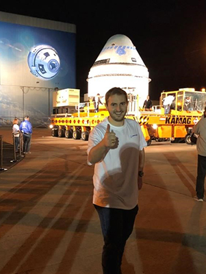Mitch Carson in front of the Boeing Starliner