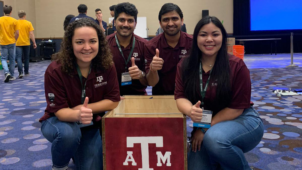 From left, Texas A&amp;M GeoWall Team members Jessica Escobedo, Muhammad Ali Falak, Prince Kumar and Bridget Le with their wall design 