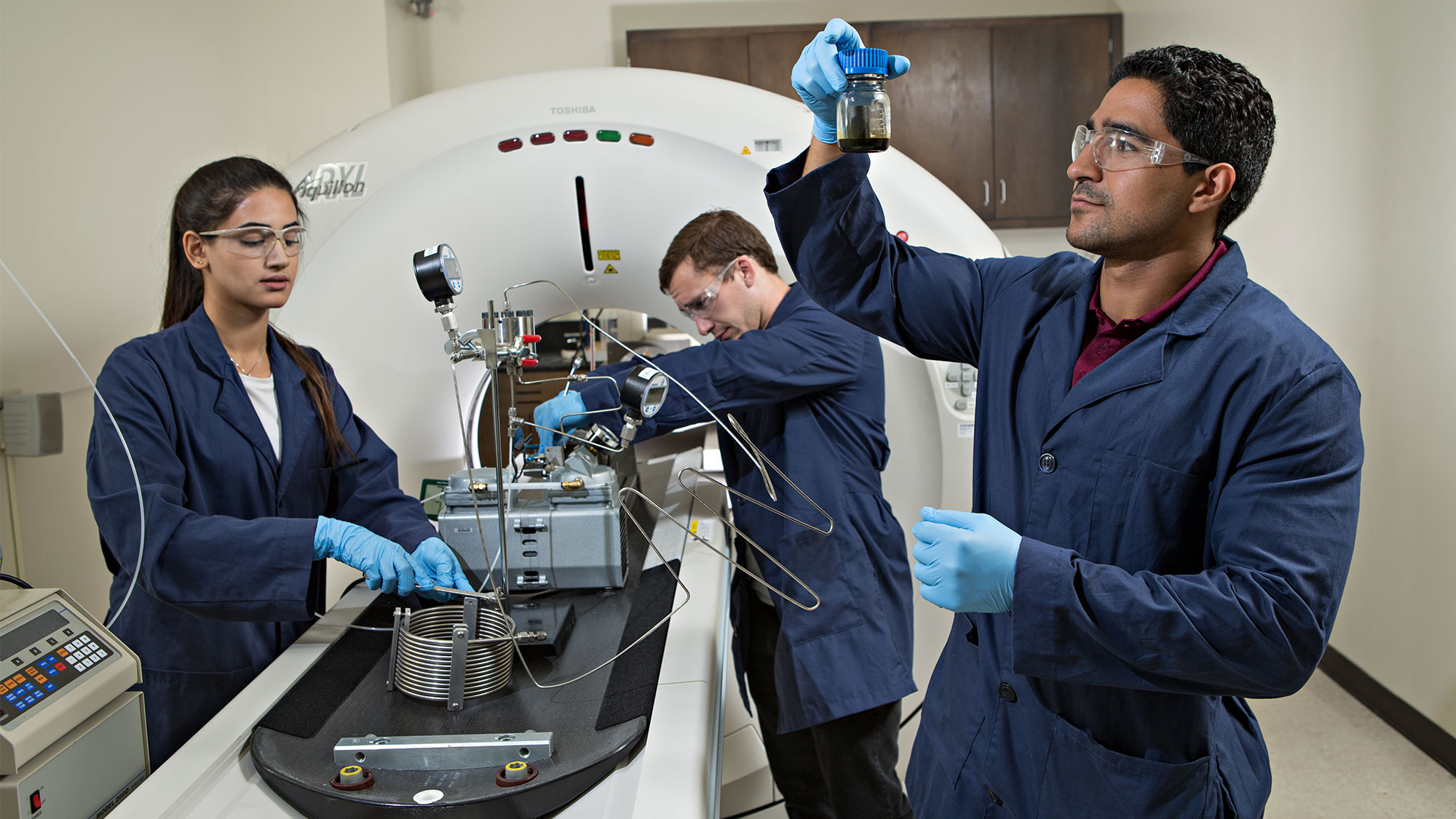 Petroleum engineering students working in the Chevron Petrophysical Imaging Laboratory