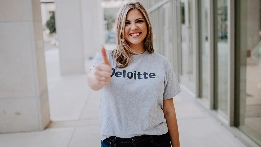 Clara Cliver wearing Deloitte shirt.