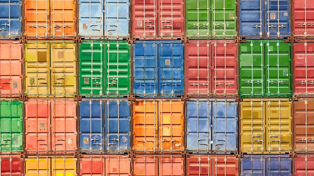 Colorful shipping containers stacked on top of each other
