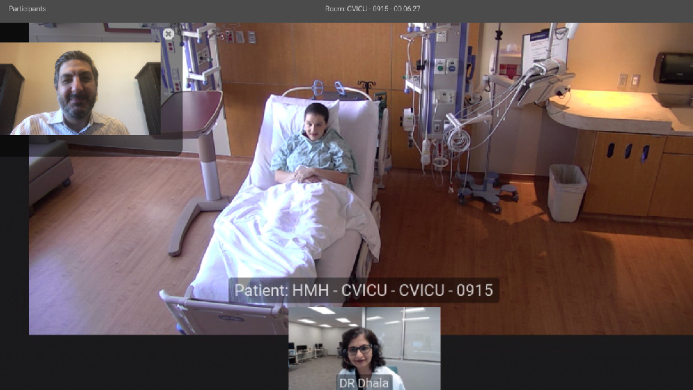 Researchers test the connection of the virtual ICU for COVID-19 patients. 