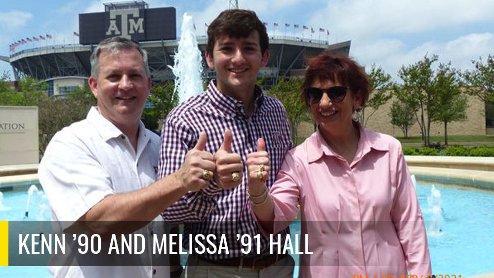 Kenn and Melissa hall posing for a photo with their son and they are all doing a gig 'em thumbs up. 