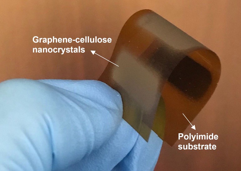A close-up photo of film highlighting graphene-cellulose nanocrystal and polyimide substrate. 