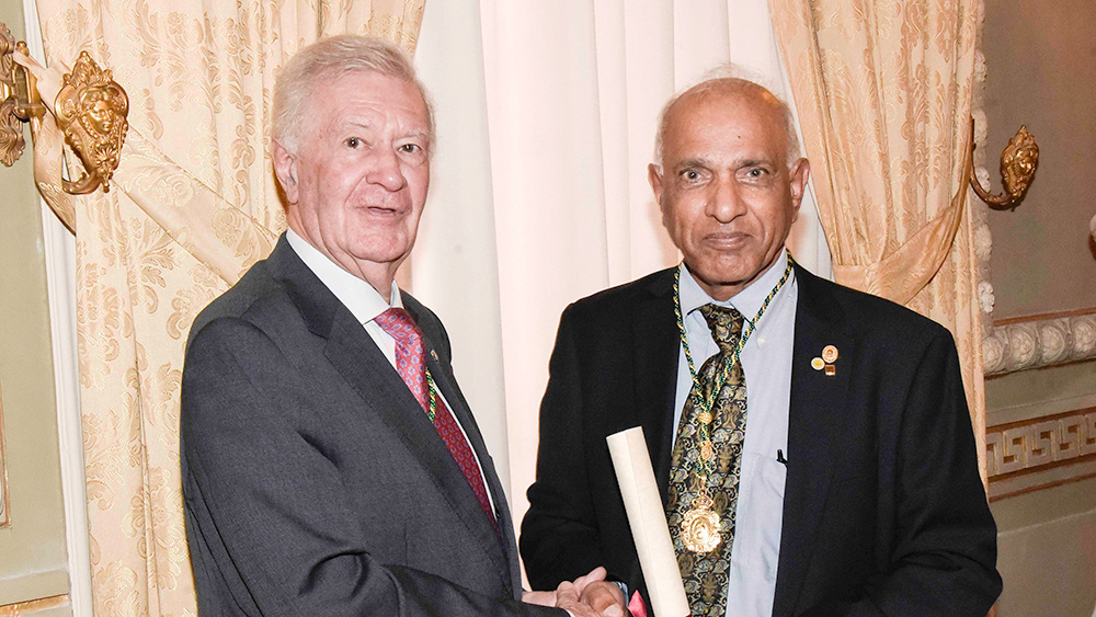 Dr. J.N. Reddy with a representative from the Spanish Royal Academy of Engineering