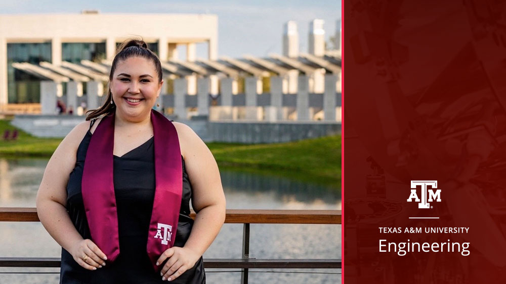 Abbey Weyand wears her graduation stole and stands in front of a lake in Aggie Park and a campus building. 