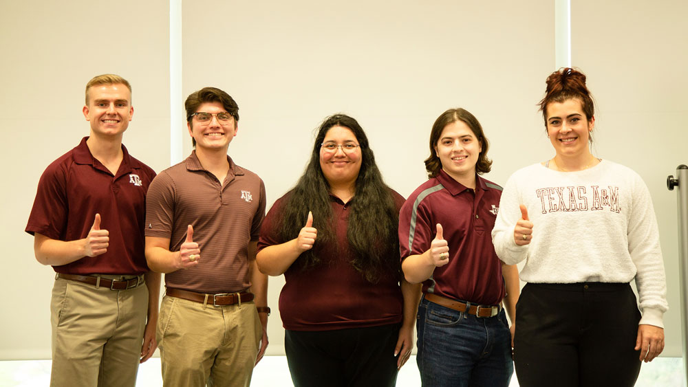 The cybersecurity team of interdisciplinary students poses in a group: Connor McLaren, Martin Jimenez, Yajaira Puente, Tristian Koster and Camryn Ochs. 