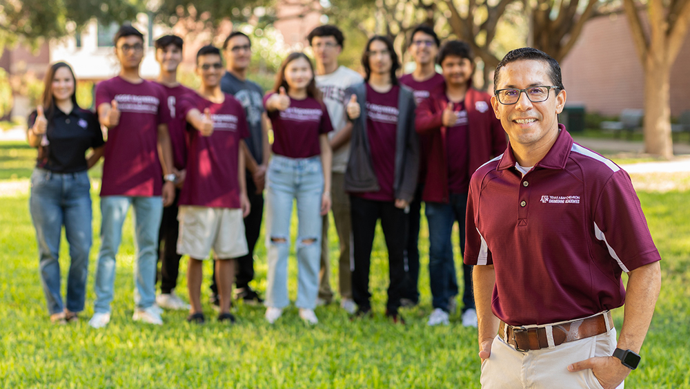 Leo Alvarado, front right in focus, stands outside at South Texas College campus with the first cohort of 10 Engineering Academy students as well as the Engineering Academy project manager. 