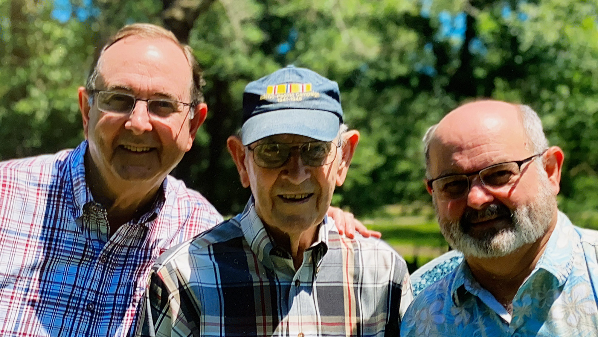 Larry Gordy '72 and Craig Gordy '75 standing with their father, Earl R. Gordy '50.