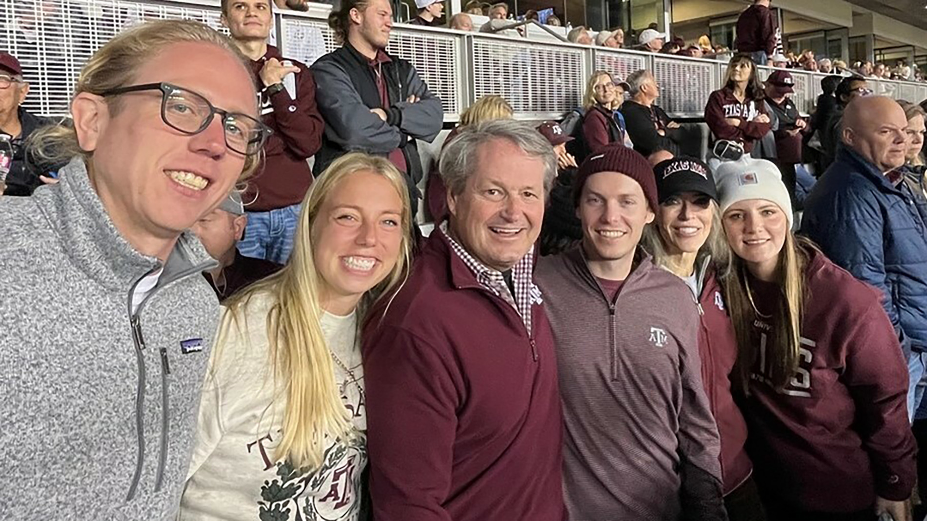 Katie Klassen ’16, Craig Mesenbrink ’84, Samantha Mesenbrink, Mitchell Mesenbrink ’16 and Moriah Mesenbrink ’16 attend a football game.