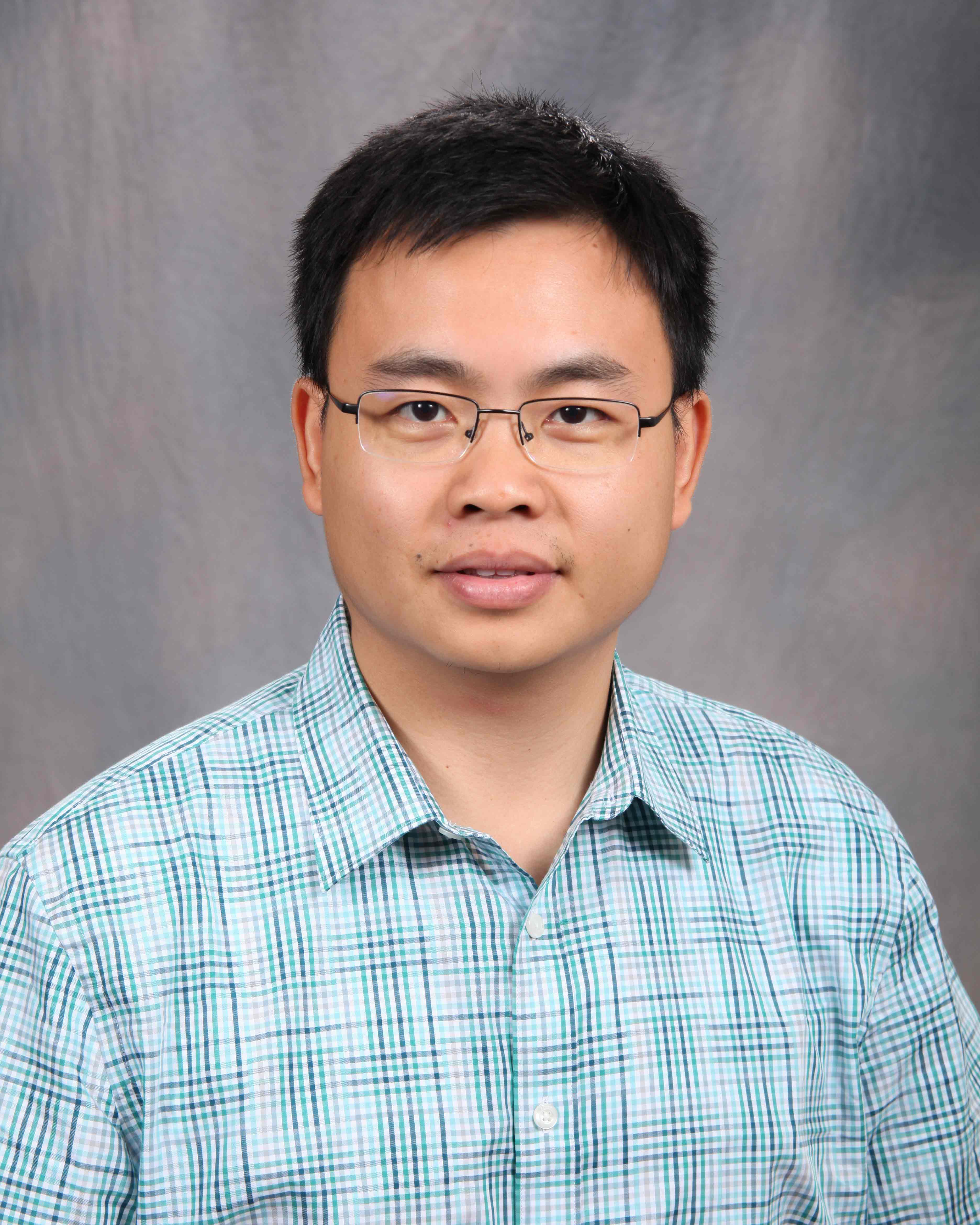 Headshot of Dr. Le Xie.
