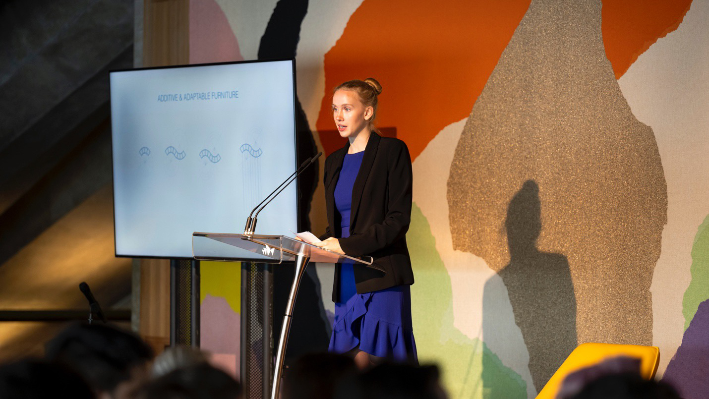 Astrid presents with her four teammates in the Joern Utzon room of the Opera House.