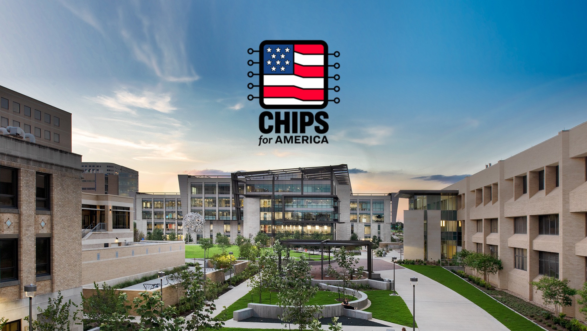 Engineering quad buildings at sunset with the Chips for America logo above the Zachry Engineering Education Complex. 