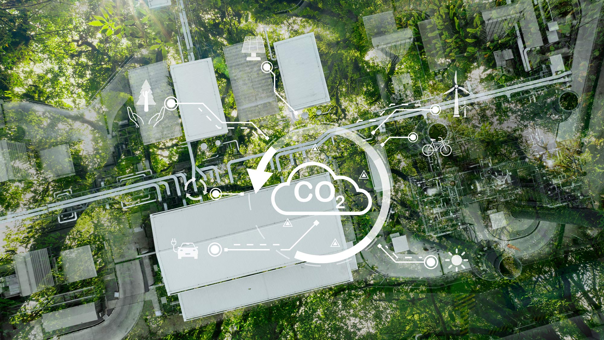 A factory overlayed with a forest and a graphic depicting the effects of carbon dioxide offsets.