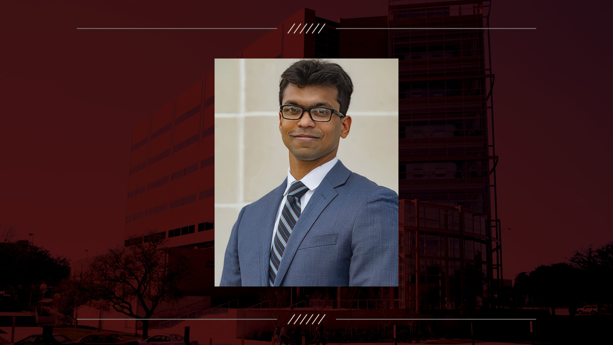 Headshot of a person on a maroon background.