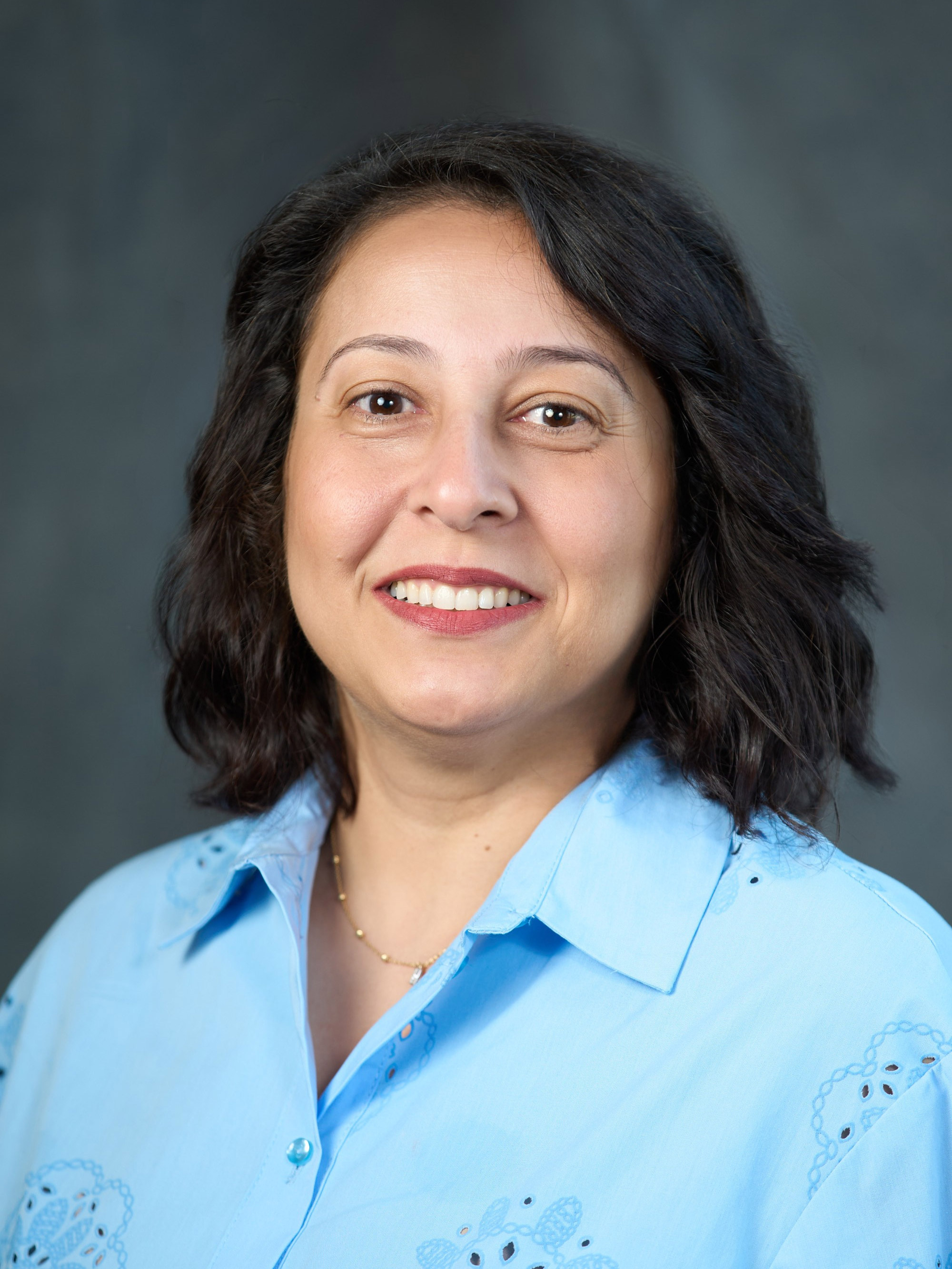 Headshot of Dr. Marian Zaki.