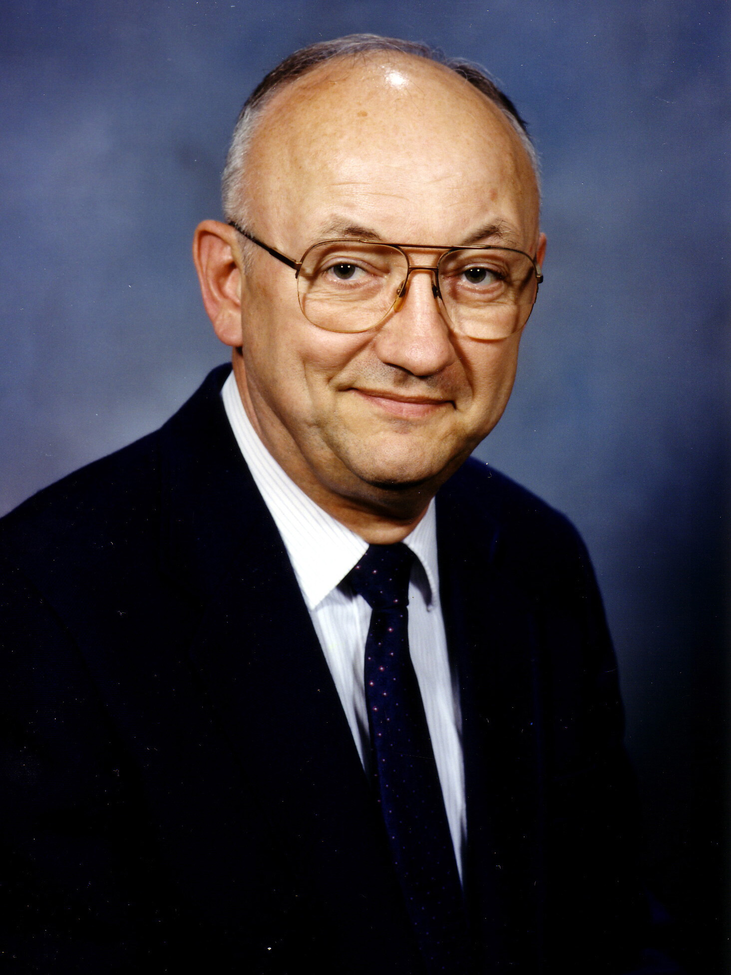 A headshot of Tom Reddin.