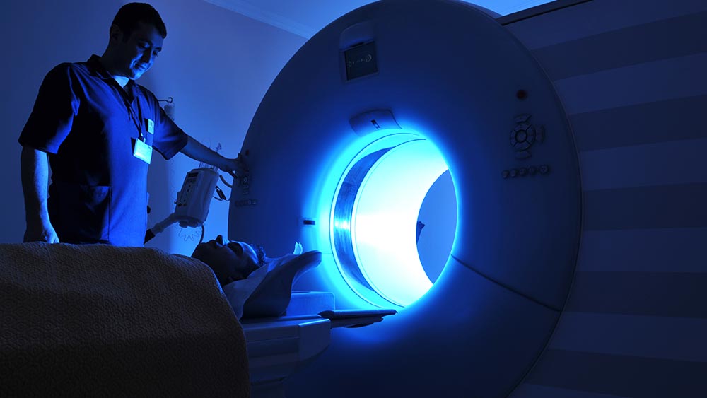 A patient prepares to undergo an MRI. 