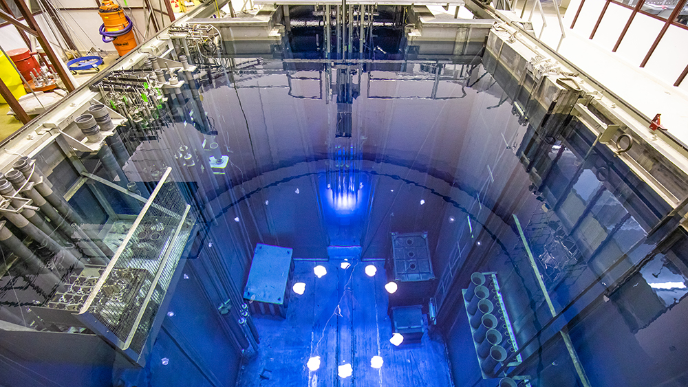 View of TRIGA reactor pool with reactor operating 