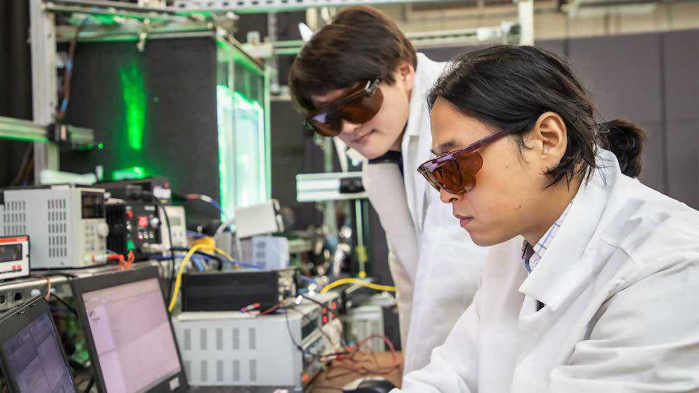 Two male students working inside the lab